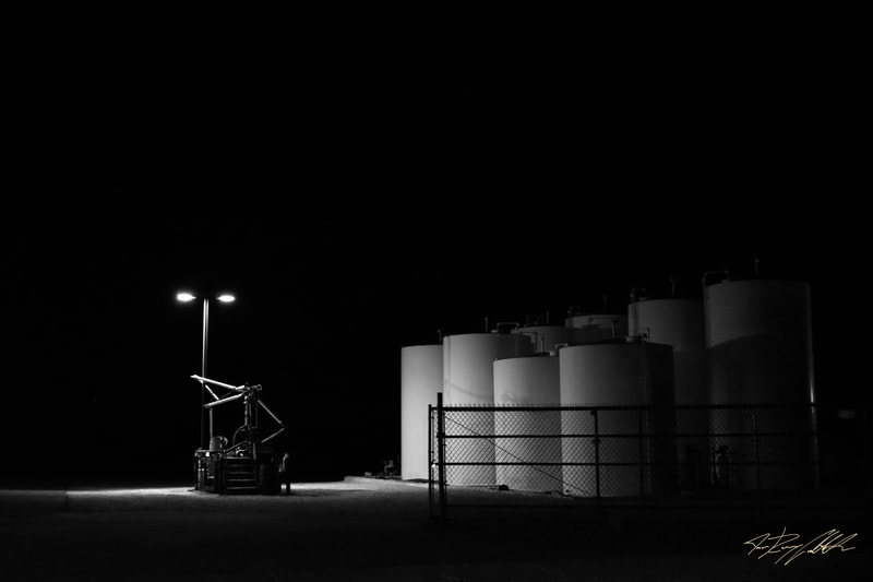 Black and white industrial landscape photograph.