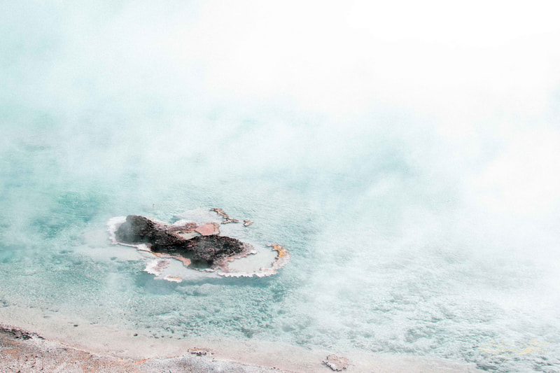 Photograph of a natural pool in Yellowstone National Park.